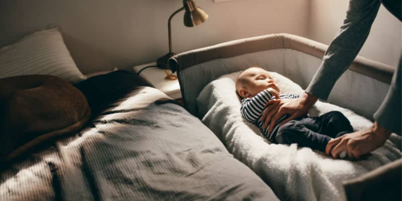 baby room sharing with his parents in a co-sleeping crib